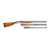 A Merkel 203 over-and-under shotgun with interchangeable over-and-under shotgun barrel and rifle barrel, with Schmidt & Bender scope