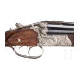 A cased double-rifle drilling, Suhl, with Zeiss scope
