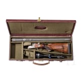 A cased double-rifle drilling, Suhl, with Zeiss scope