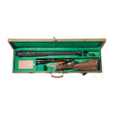 A triple barrel combination gun, Franz Sodia, Ferlach, with Zeiss scope, in a case