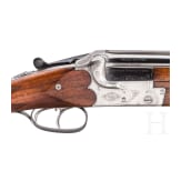 A Merkel over-and-under rifle with Zeiss scope, interchangeable O/U combination barrel with Zeiss scope, interchangeable O/U shotgun barrel