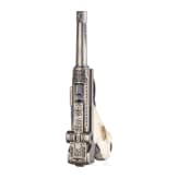 A Mauser Parabellum 06/73 engraved with English arabesques, in case with accessories