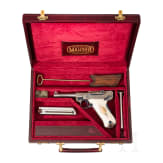 A Mauser Parabellum 06/73 engraved with English arabesques, in case with accessories