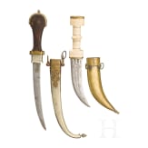 Four Oriental daggers, 20th century