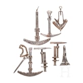 A group of Afghan combination tools and belt pendants, 19th century