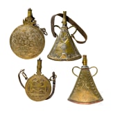Four Moroccan powder flasks, 19th and 20th century