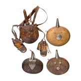 Four Afghan powder flasks, 19th century