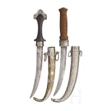 Two Moroccan silver-mounted koummyas, around 1900