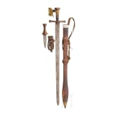 A kaskara and an arm dagger, North Africa, circa 1900
