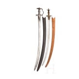 Two Indian tulwars with scabbards, 19th century