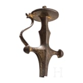 An Indian gilded tulwar grip, 19th century