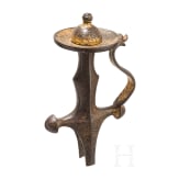 An Indian gilded tulwar grip, 19th century