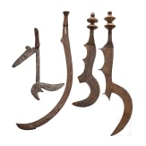 A sabre weapon of the Benge, a throwing knife of the Zande and two Ngombe swords