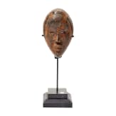 A miniature mask of the Dan tribe, Liberia