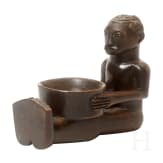 A wooden sculpture of a sitting boy holding a bowl, Luba, Congo