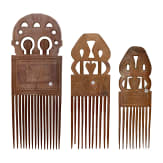 Three large African wooden combs