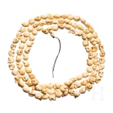 A Tibetan skull necklace, circa 1900