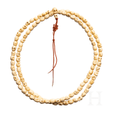 A Tibetan skull necklace, circa 1900