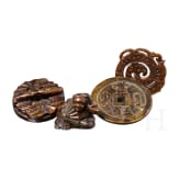 Four Japanese or Chinese miniatures in jade and bronze, circa 1900