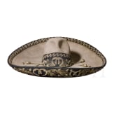 A sombrero with silver embroidery and a long knife, Mexico, 19th century