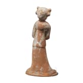 A ceramic figurine of a standing lady, China, Tang period