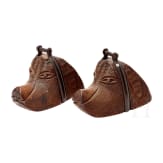 A pair of South American stirrups in the shape of a dog's head, 19th century