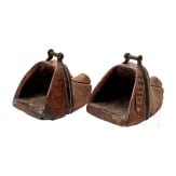 A pair of South American stirrups in the shape of a dog's head, 19th century