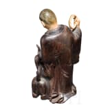 Monk with dog, carving in wood and ivory, China, around 1900