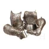Four Gothic harness parts, in the style around 1480/90