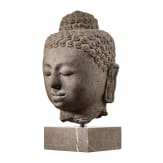 A large Buddha head carved in volcanic rock, Borobudur/Java, 9th century