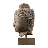 A large Buddha head carved in volcanic rock, Borobudur/Java, 9th century