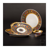 A Russian plate, two oval bowls and a spice container from the Gothic service, Imperial Porcelain Manufactory St. Petersburg, reign of Tsar Nicholas I, ca. 1833/40
