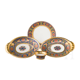A Russian plate, two oval bowls and a spice container from the Gothic service, Imperial Porcelain Manufactory St. Petersburg, reign of Tsar Nicholas I, ca. 1833/40