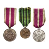 Three international medals, 19th and 20th centuries