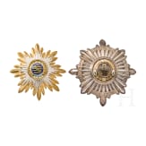 Two German helmet emblems
