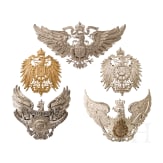 Five German helmet emblems