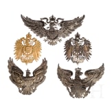 Five German helmet emblems