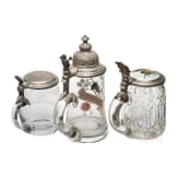 Three civilian glass jugs, German, first half of the 20th century