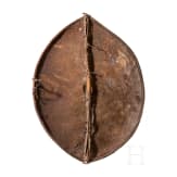 A large Massai shield and African weapons, circa 1900
