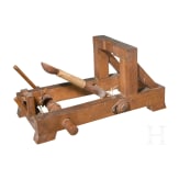 A detailed model of a catapult, circa 1900