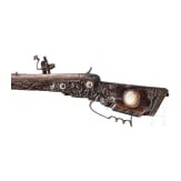 A southern German carved wheellock rifle with mother-of-pearl inlays in the style of the Maucher family of Schw&auml;bisch-Gm&uuml;nd, late 17th century