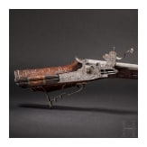 A fine wheellock rifle with chiseled lock, Augsburg, circa 1700