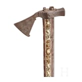 A Silesian battle axe with integrated flintlock and dagger, circa 1700