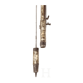 A Silesian battle axe with integrated flintlock and dagger, circa 1700