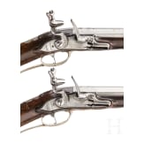 A pair of silver-mounted flintlock rifles, Elferding, Onoldsbach (Ansbach/Bavaria), circa 1730