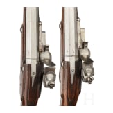 A rare pair of flintlock holster pistols made for superimposed loads, from the armoury of the Princes of Salm-Reifferscheidt-Dyck, northern German or Dutch, circa 1660