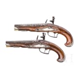 A pir of silver-mounted flintlock travel pistols, German/France, ca. 1730
