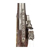 A deluxe German flintlock pistol with fine chiselling, circa 1730
