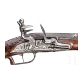 A silver-mounted long flintlock pistol, Dresden, ca. 1740