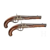 A fine pair of southern German percussion pistols with chiseled mounts, circa 1780